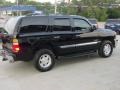 2004 Onyx Black GMC Yukon SLT 4x4  photo #18