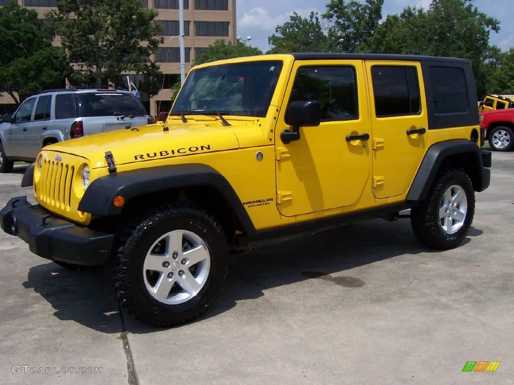 Yellow jeep wrangler unlimited rubicon