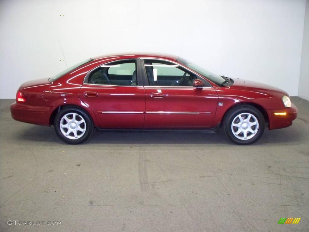 2003 Sable LS Premium Sedan - Matador Red Metallic / Medium Graphite photo #4