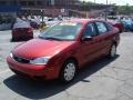 2005 Sangria Red Metallic Ford Focus ZX4 S Sedan  photo #15