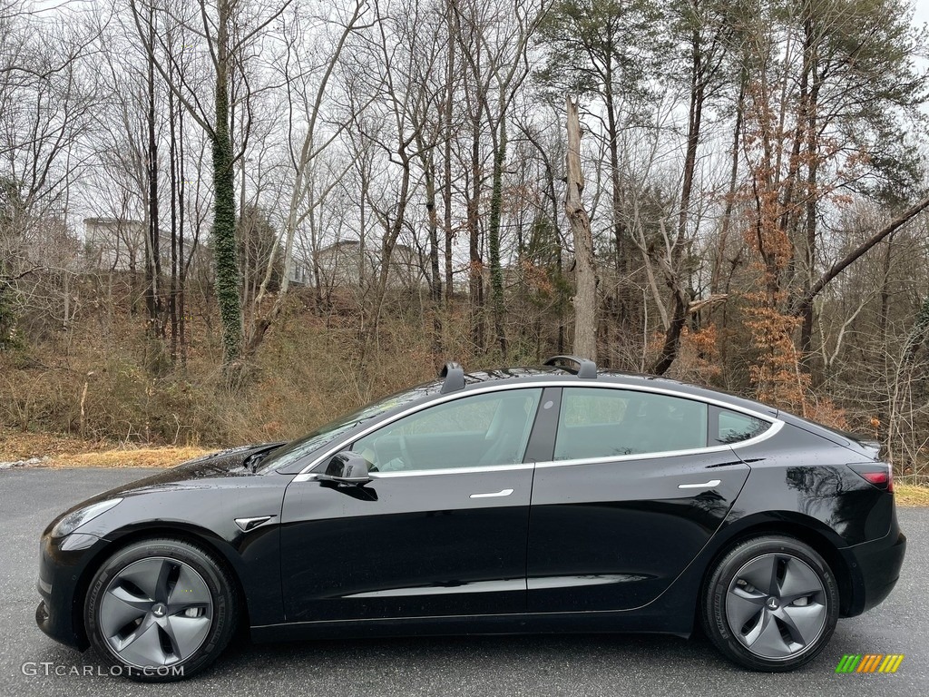 Solid Black 2019 Tesla Model 3 Performance Exterior Photo #140921317
