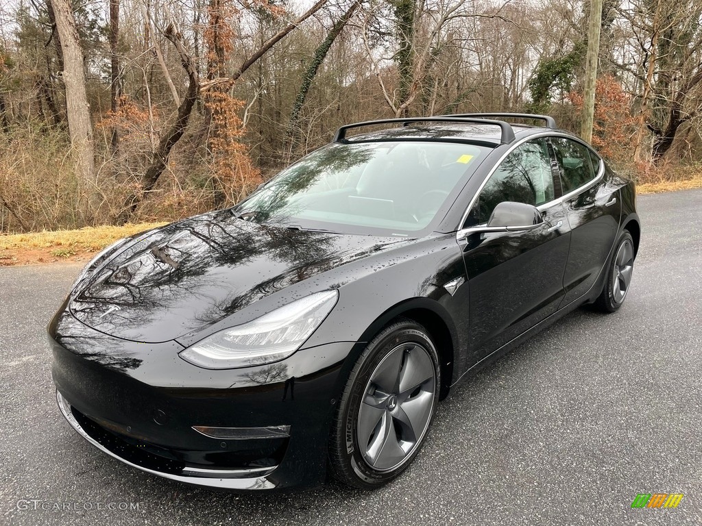 Solid Black 2019 Tesla Model 3 Performance Exterior Photo #140921359