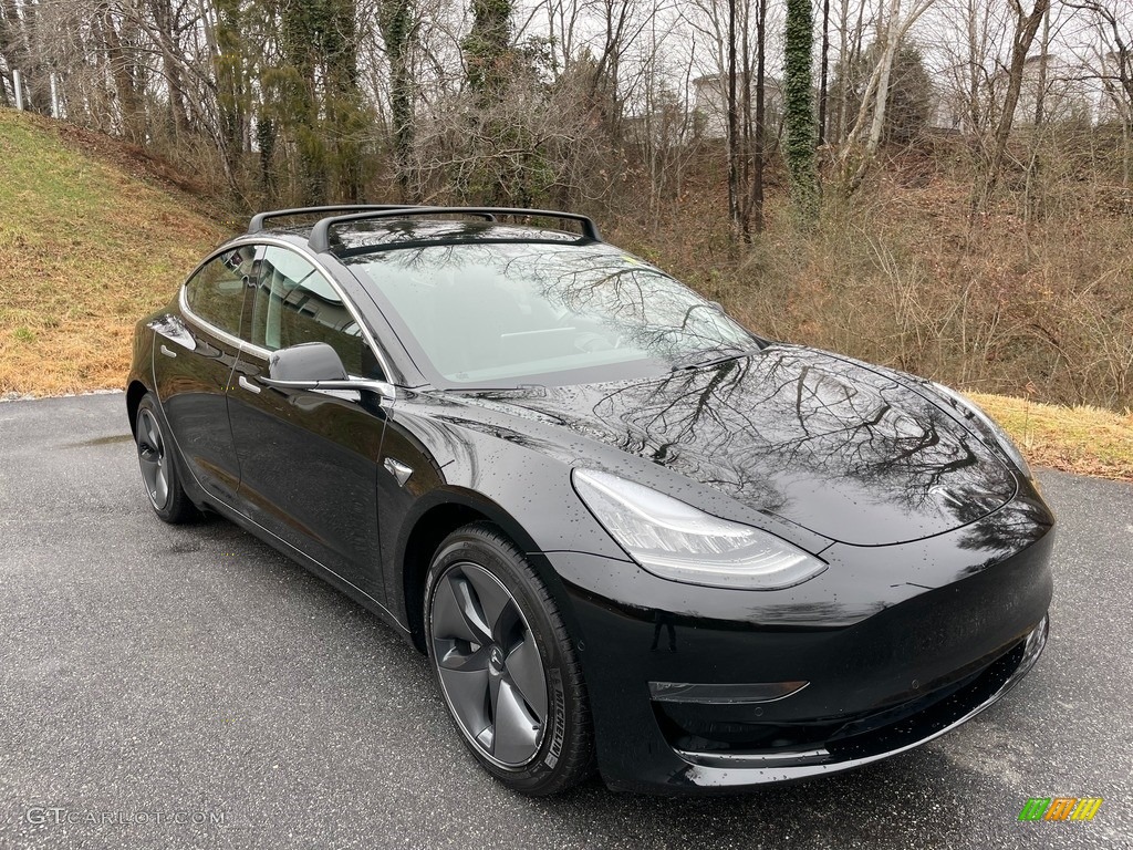 Solid Black 2019 Tesla Model 3 Performance Exterior Photo #140921422