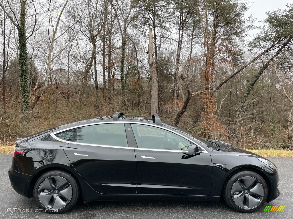 Solid Black 2019 Tesla Model 3 Performance Exterior Photo #140921452