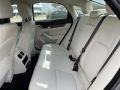 2021 Jaguar XF Light Oyster Interior Rear Seat Photo