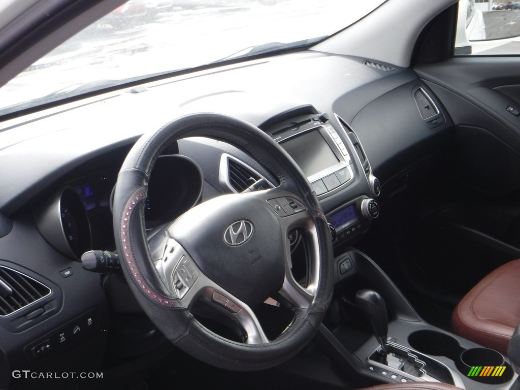 2011 Tucson Limited AWD - Cotton White / Black/Saddle photo #11