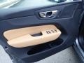 2021 Volvo XC60 Amber/Charcoal Interior Door Panel Photo
