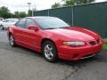 1999 Bright Red Pontiac Grand Prix GTP Sedan  photo #3