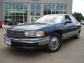 1995 Dark Calypso Green Metallic Cadillac DeVille Sedan  photo #1