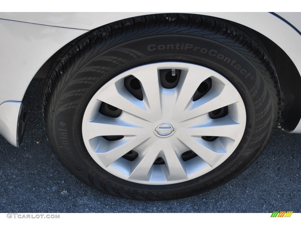 2016 Nissan Versa SV Sedan Wheel Photo #141293344