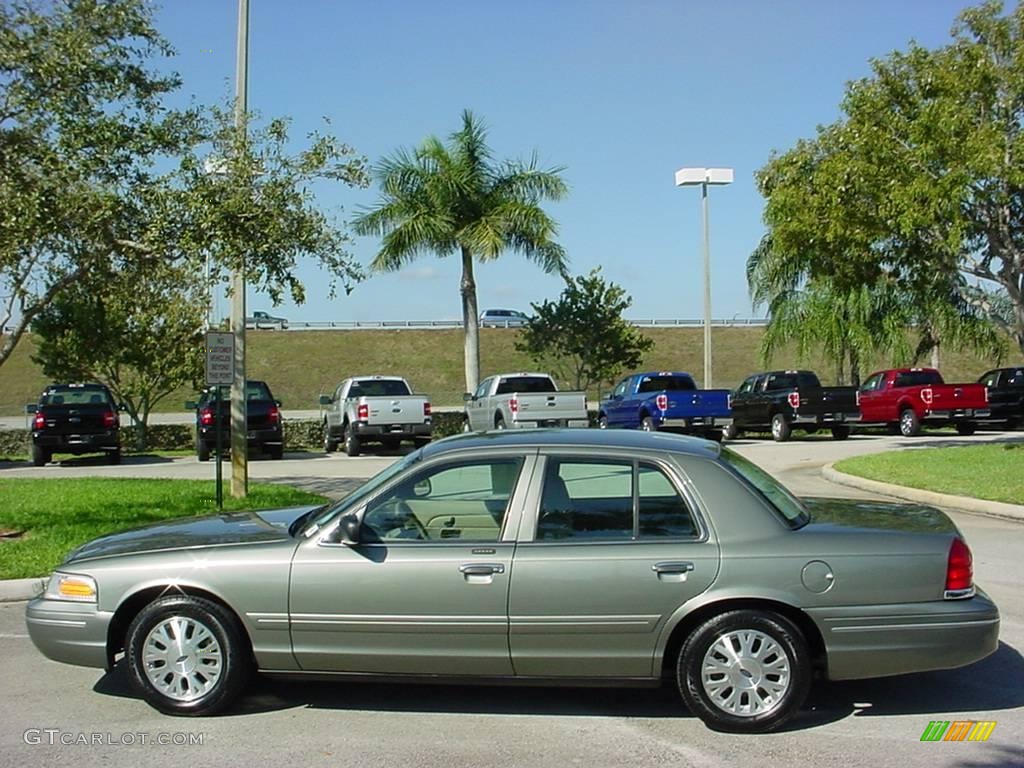 2004 Crown Victoria LX - Spruce Green Metallic / Medium Parchment photo #6