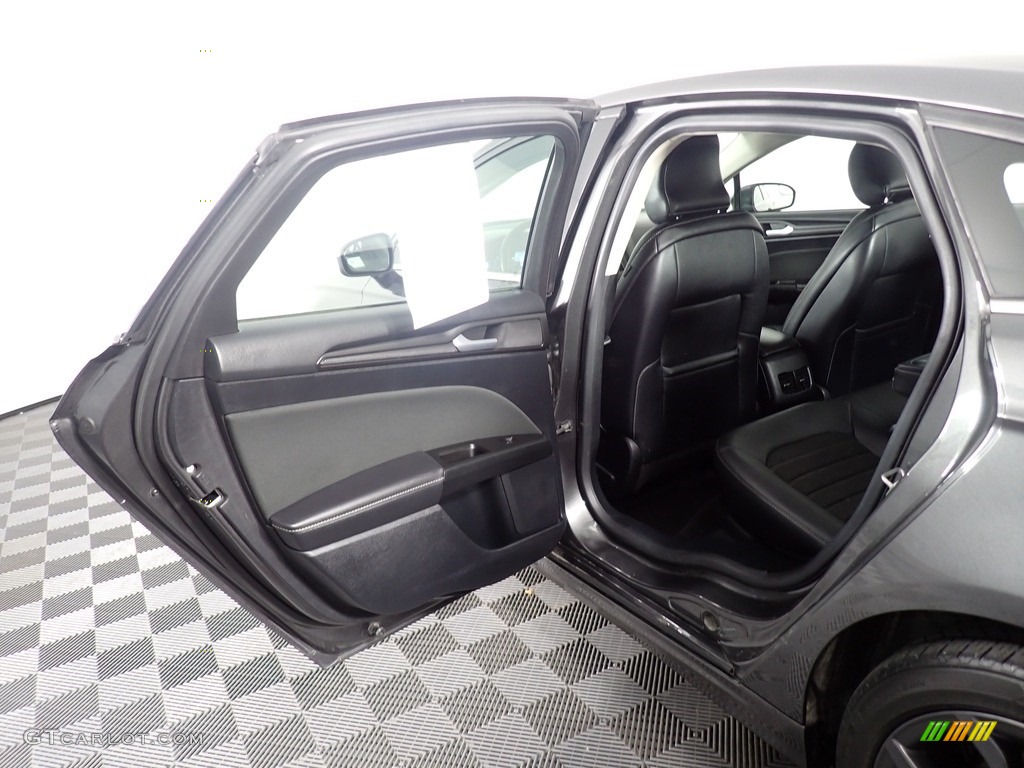 2018 Ford Fusion SE AWD Ebony Door Panel Photo #141696324