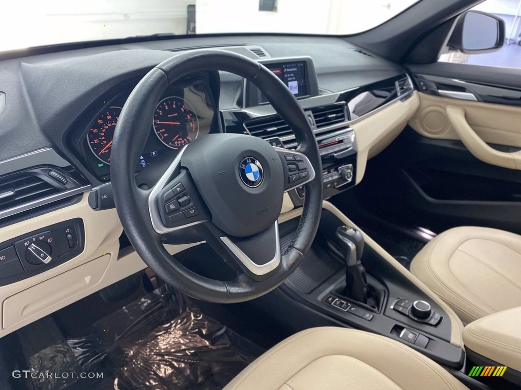 2018 X1 xDrive28i - Mediterranean Blue Metallic / Canberra Beige photo #16