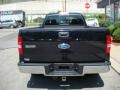 2005 Black Ford F150 XLT Regular Cab  photo #3