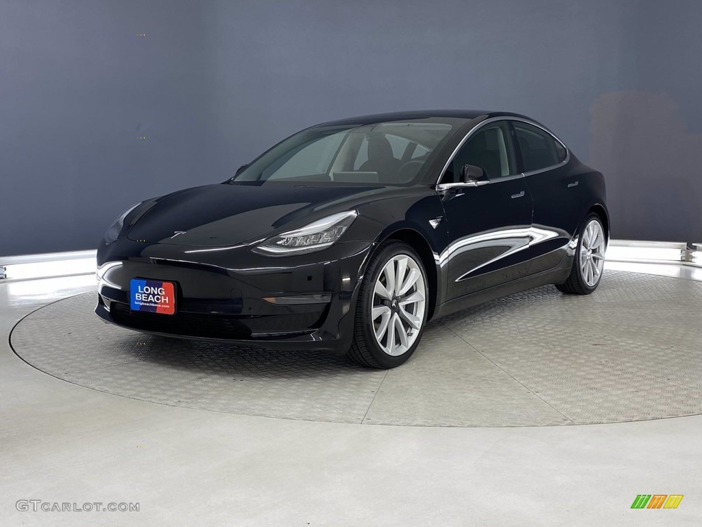Solid Black 2020 Tesla Model 3 Standard Range Exterior Photo #141873679
