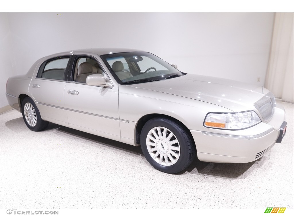 Pueblo Gold Metallic Lincoln Town Car