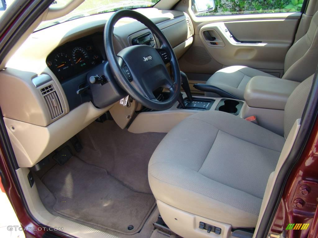 2002 Grand Cherokee Laredo 4x4 - Dark Garnet Red Pearlcoat / Sandstone photo #10