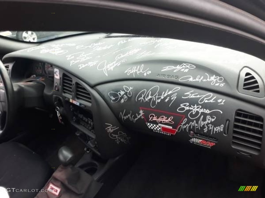 2002 Chevrolet Monte Carlo #3 Signed Tribute Race Car Dashboard Photos