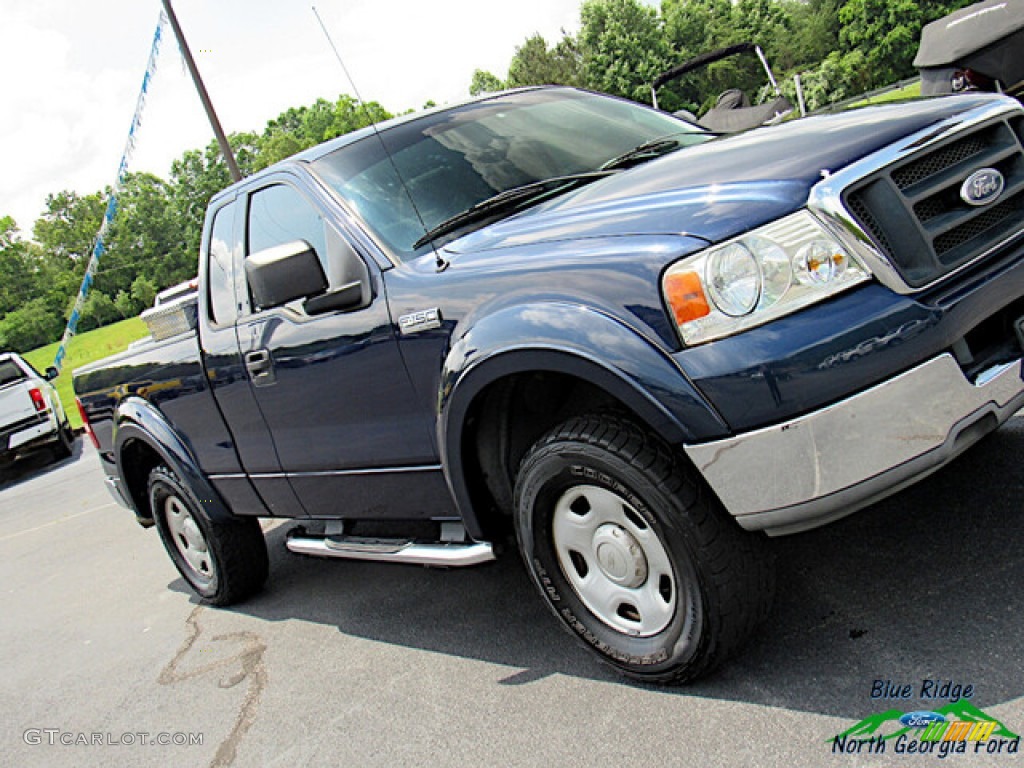 2004 F150 STX Regular Cab - Medium Wedgewood Blue Metallic / Dark Flint photo #20