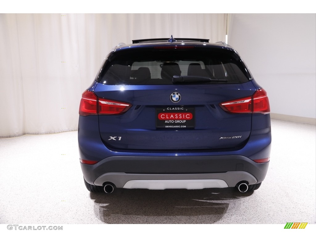 2018 X1 xDrive28i - Mediterranean Blue Metallic / Black photo #22