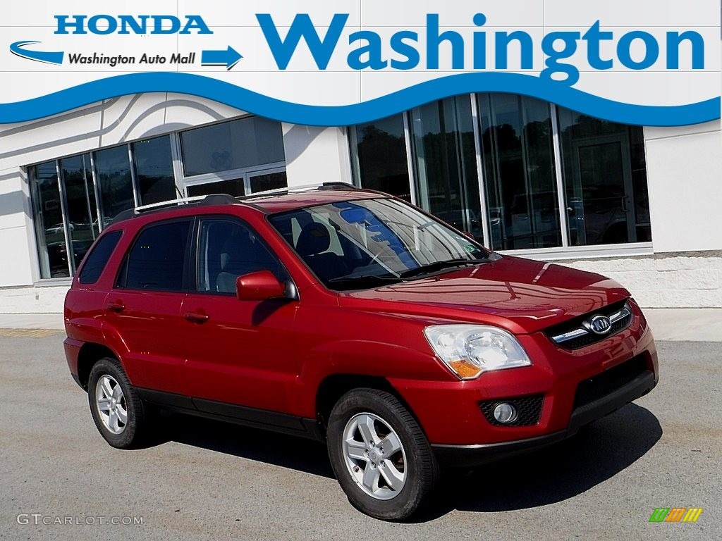 2009 Sportage EX V6 4x4 - Volcanic Red / Black photo #1