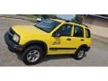 Yellow 2003 Chevrolet Tracker ZR2 4WD Hard Top