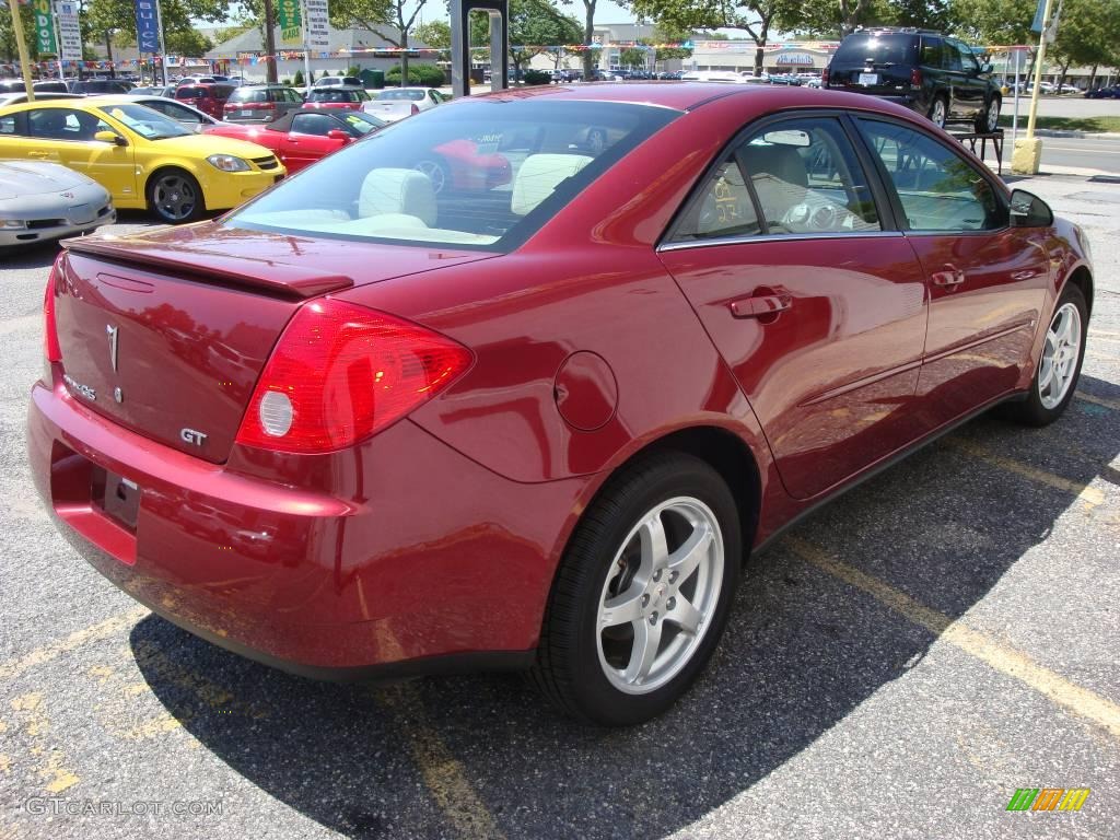 2009 G6 GT Sedan - Performance Red Metallic / Light Taupe photo #6