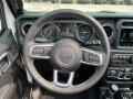 Black 2021 Jeep Wrangler Unlimited Sahara 4xe Hybrid Steering Wheel