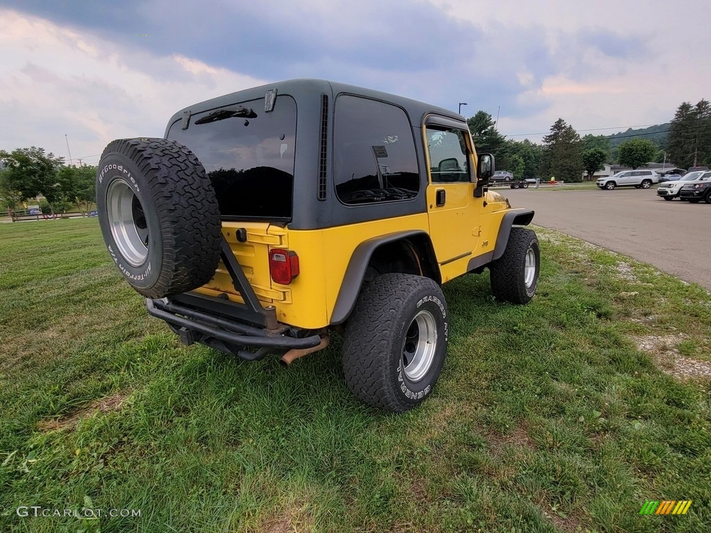 2002 Wrangler Sport 4x4 - Solar Yellow / Agate Black photo #7