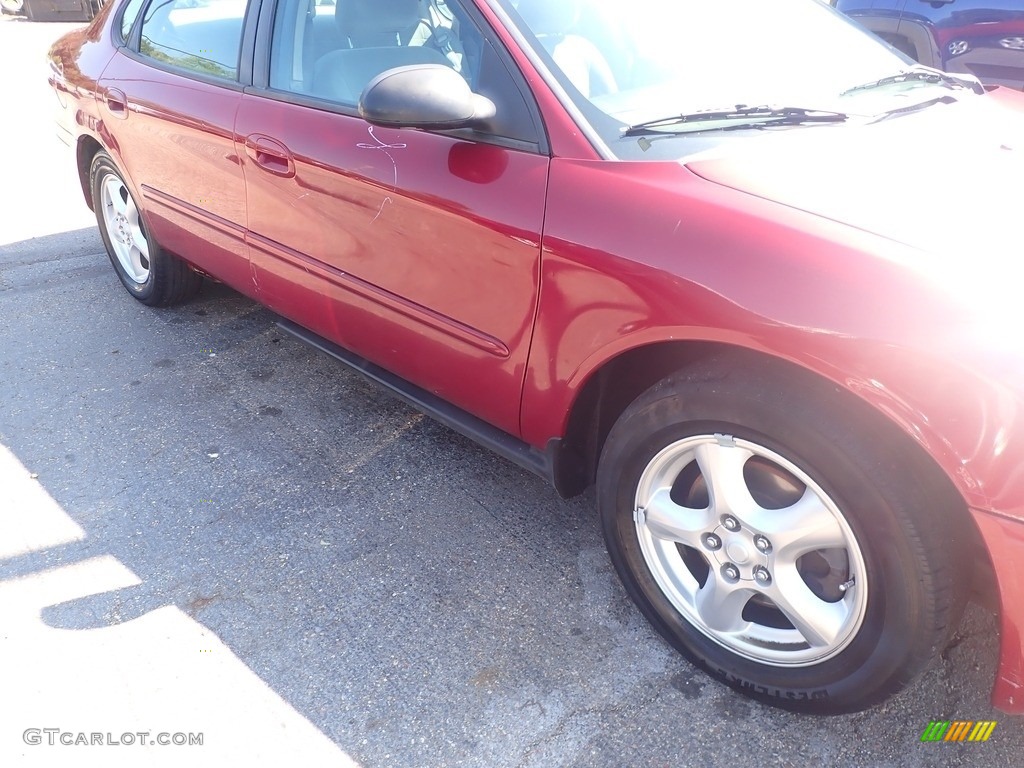2003 Taurus SE - Matador Red Metallic / Dark Charcoal photo #3