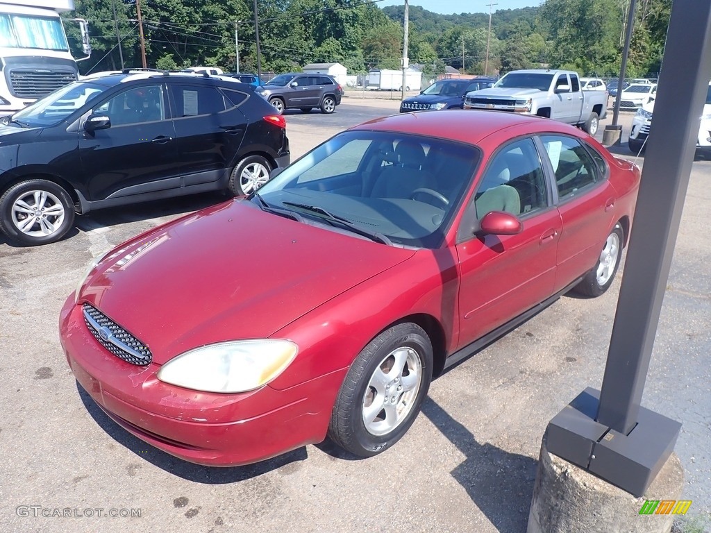 2003 Taurus SE - Matador Red Metallic / Dark Charcoal photo #7