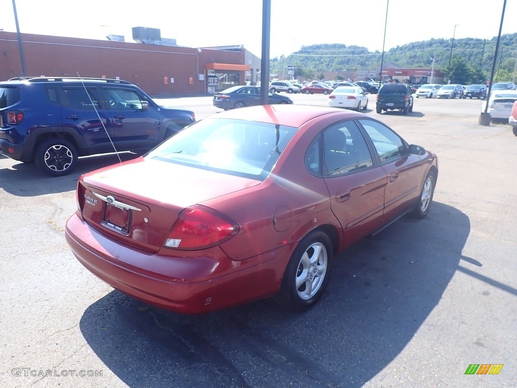 2003 Taurus SE - Matador Red Metallic / Dark Charcoal photo #11