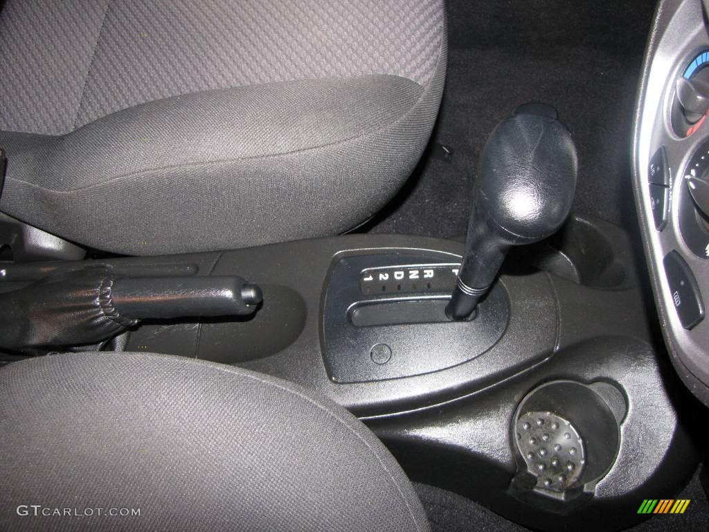 2006 Focus ZX3 SES Hatchback - Screaming Yellow / Charcoal/Charcoal photo #13