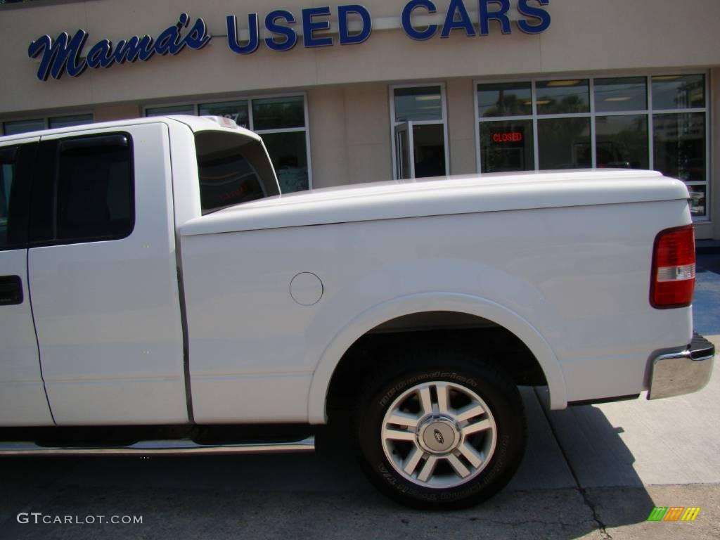 2004 F150 Lariat SuperCab - Oxford White / Black photo #25