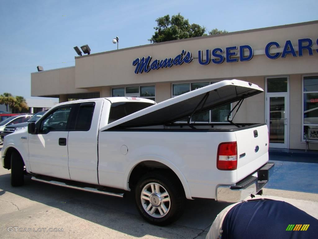 2004 F150 Lariat SuperCab - Oxford White / Black photo #27