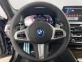 Black 2022 BMW 5 Series 530e Sedan Steering Wheel