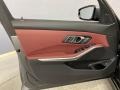 2022 BMW 3 Series Tacora Red Interior Door Panel Photo