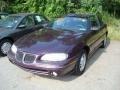 1998 Medium Purple Metallic Pontiac Grand Am SE Coupe  photo #5