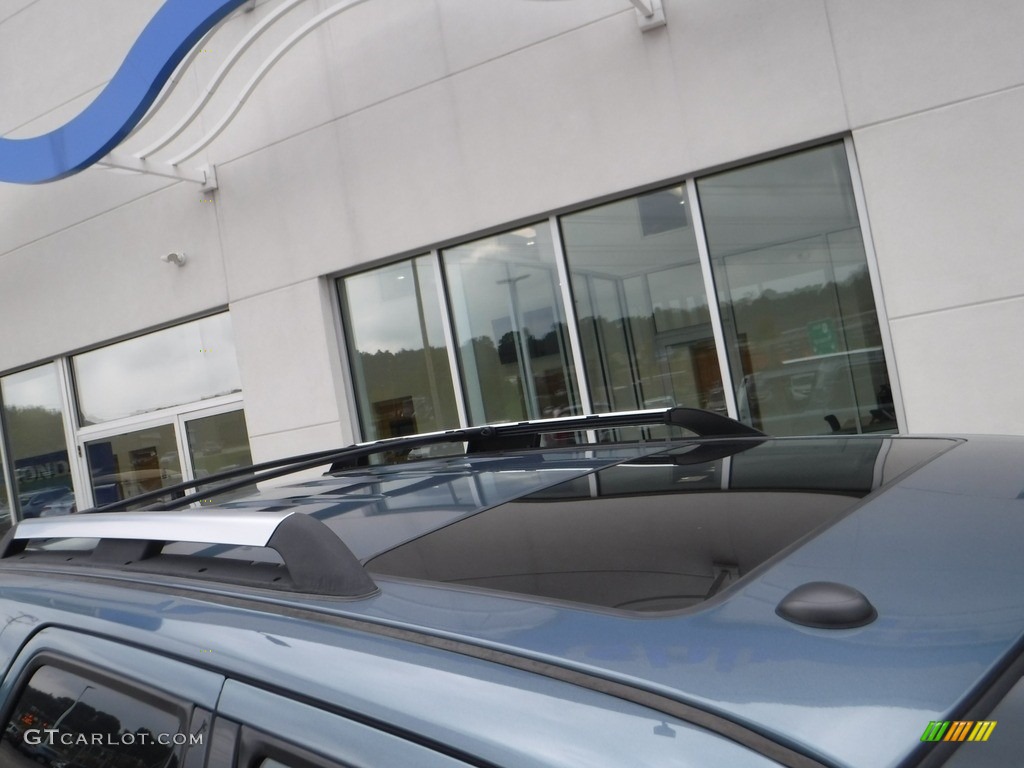 2010 Mariner V6 Premier 4WD - Steel Blue Metallic / Stone photo #3