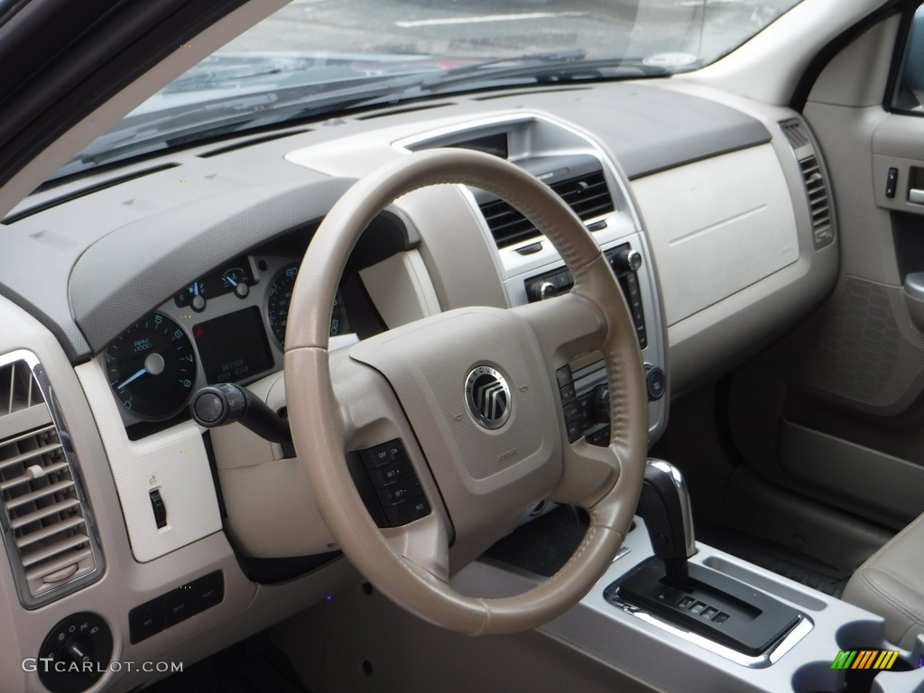 2010 Mariner V6 Premier 4WD - Steel Blue Metallic / Stone photo #13