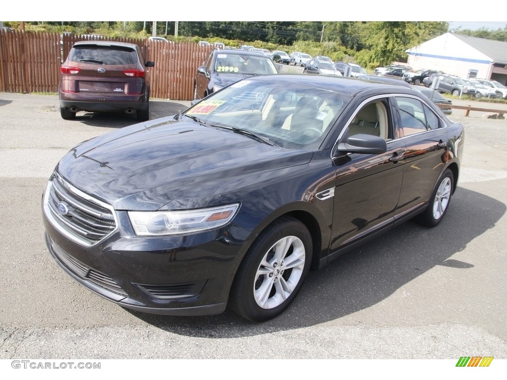 2015 Taurus SE - Tuxedo Black Metallic / Dune photo #1