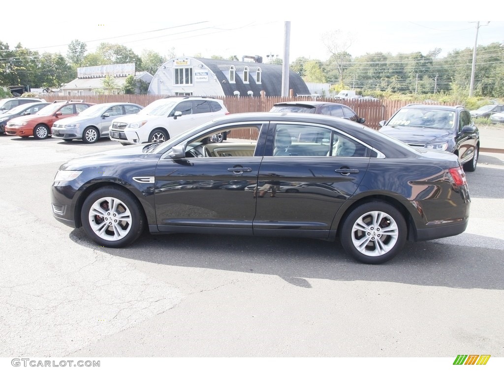 2015 Taurus SE - Tuxedo Black Metallic / Dune photo #8