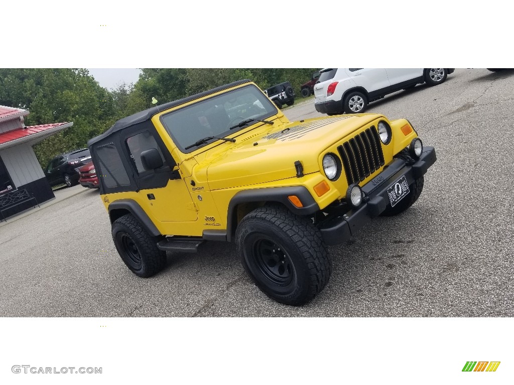 2004 Wrangler Sport 4x4 - Solar Yellow / Khaki photo #30