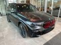 Front 3/4 View of 2022 X5 xDrive40i Black Vermillion Edition