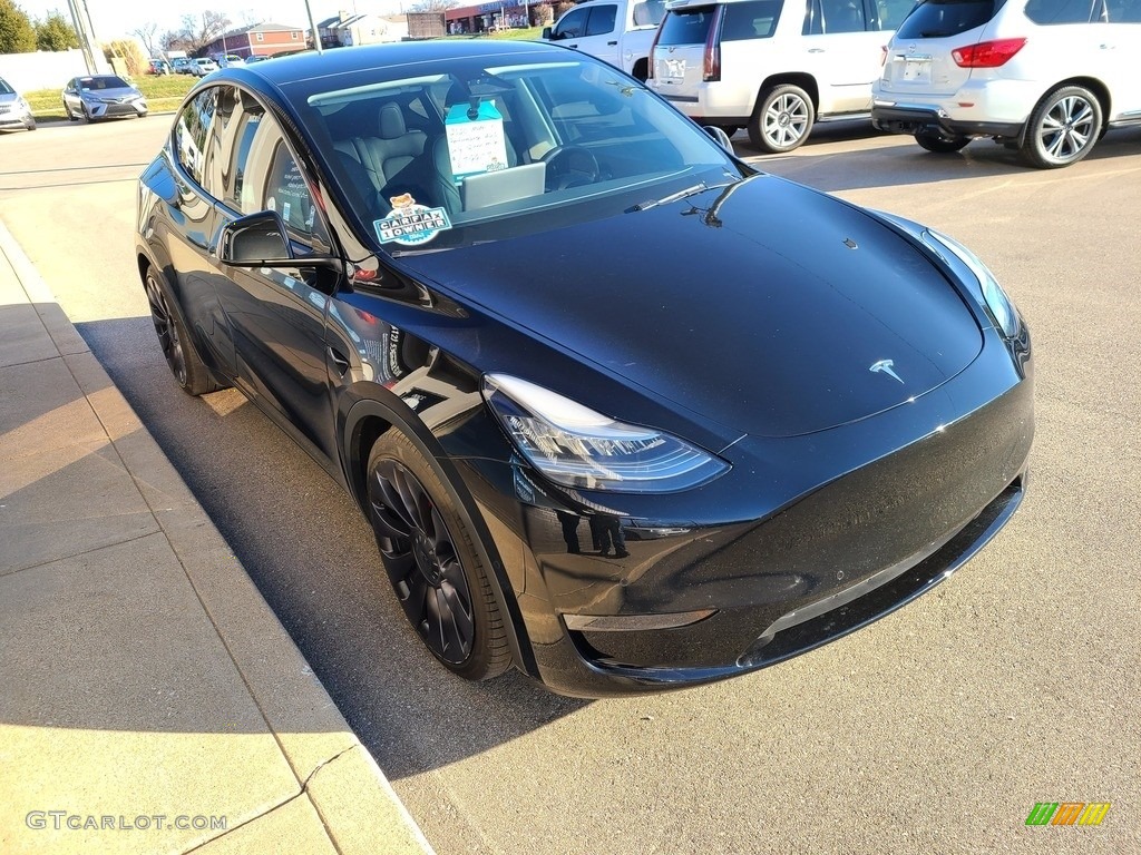 Solid Black 2020 Tesla Model Y Performance Exterior Photo #143366407