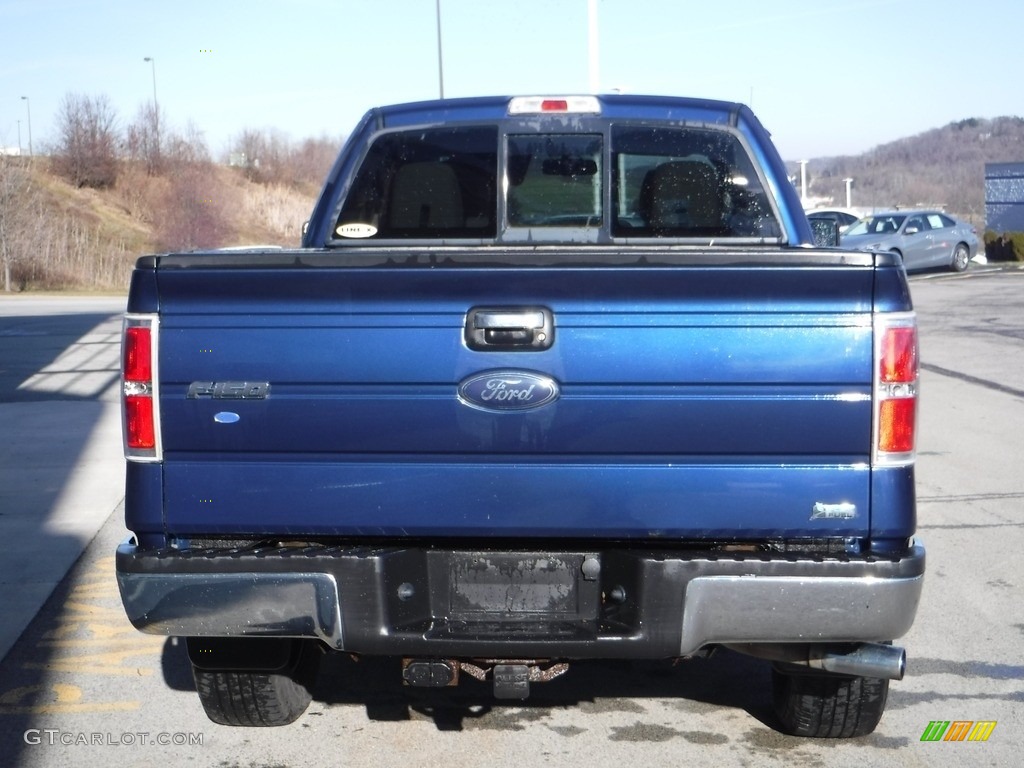 2010 F150 XLT SuperCab 4x4 - Dark Blue Pearl Metallic / Medium Stone photo #10