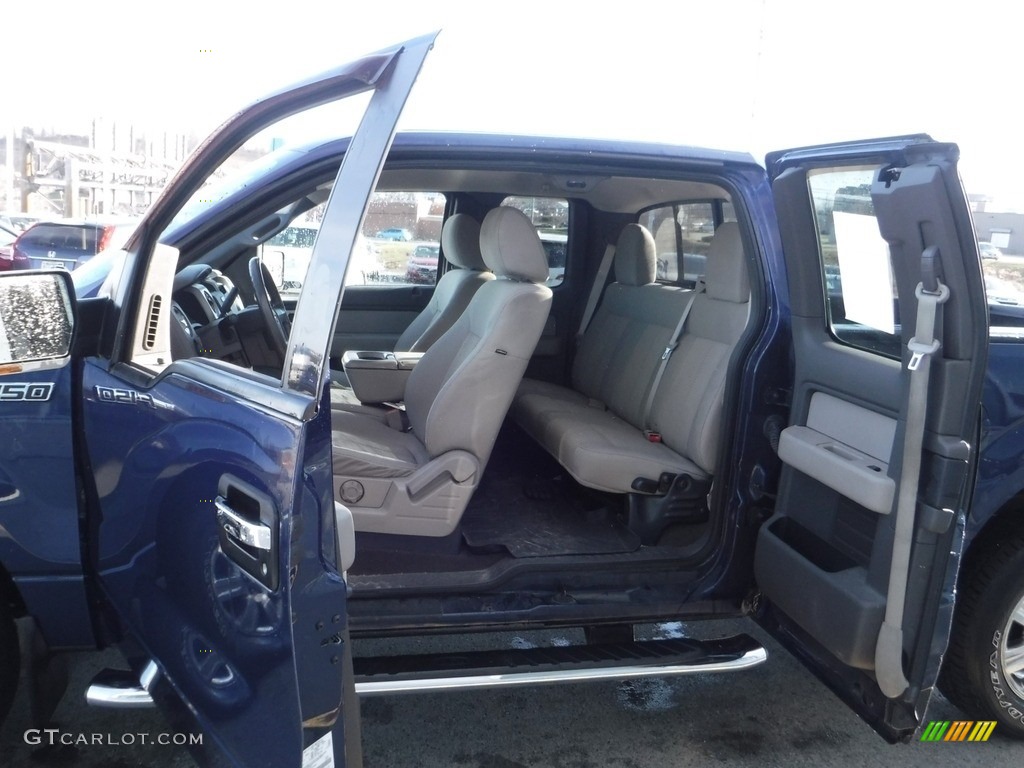2010 F150 XLT SuperCab 4x4 - Dark Blue Pearl Metallic / Medium Stone photo #13