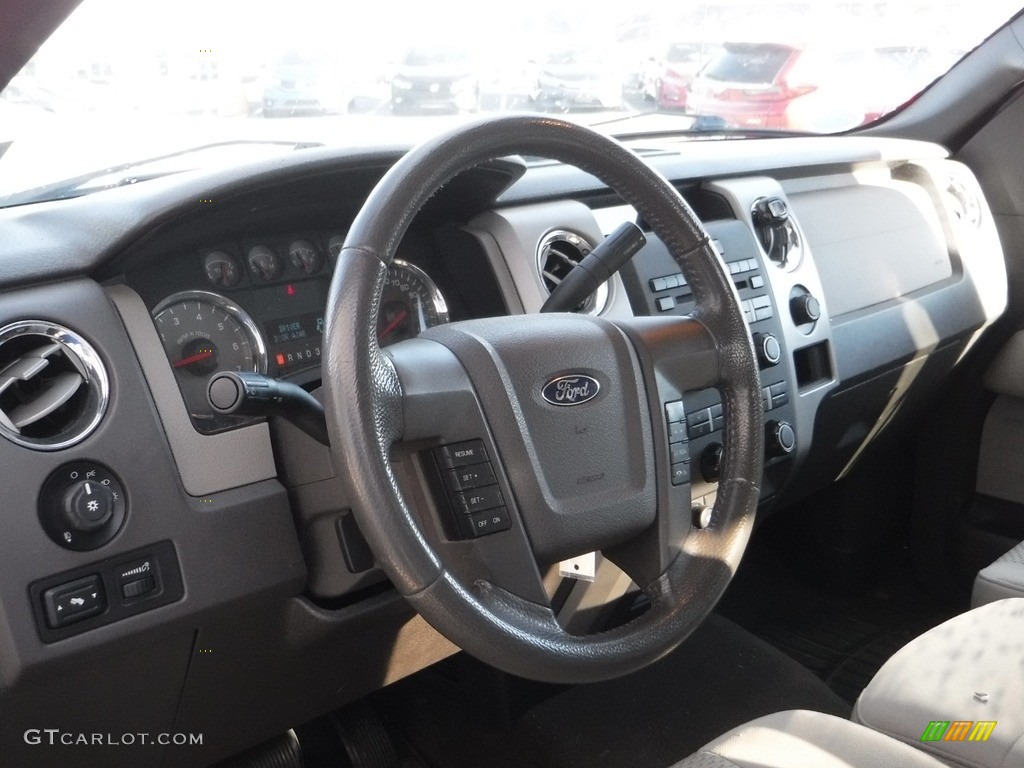 2010 F150 XLT SuperCab 4x4 - Dark Blue Pearl Metallic / Medium Stone photo #14