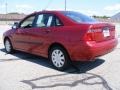 2005 Sangria Red Metallic Ford Focus ZX4 S Sedan  photo #3