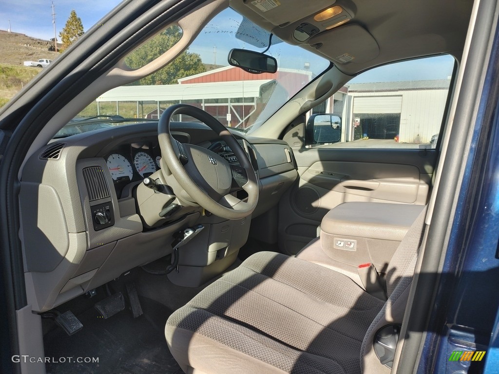 2004 Ram 2500 SLT Quad Cab 4x4 - Patriot Blue Pearl / Taupe photo #7